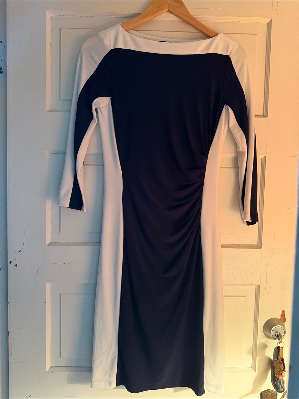 LAUREN. Color is more deep blue and off white. Just look right!